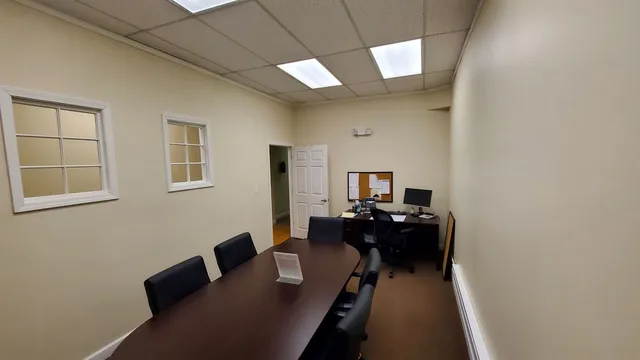 a view of workspace with wooden wall