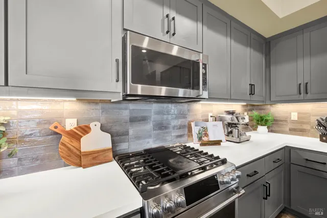 a spacious bedroom with a bed and a large window