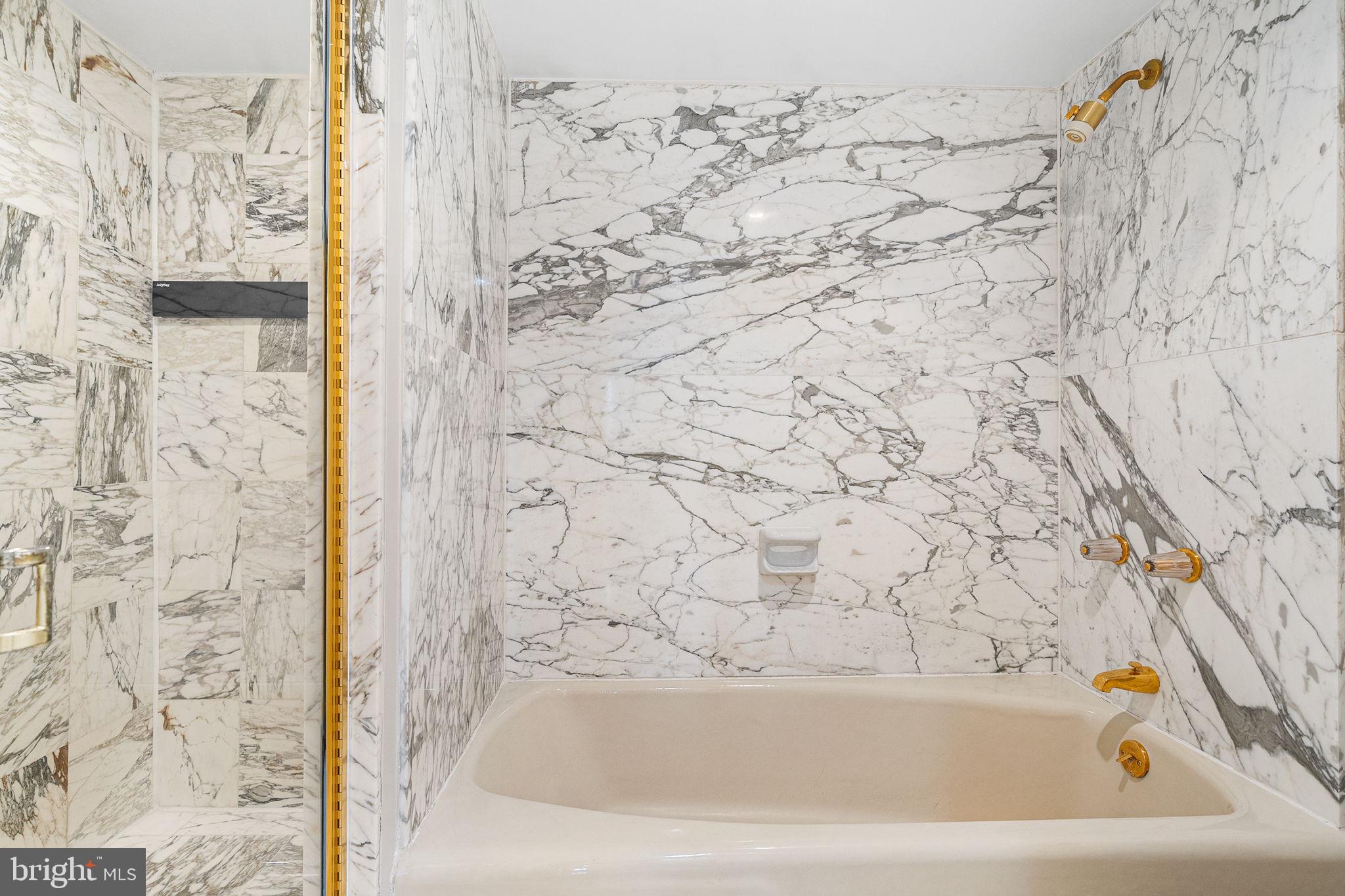 1101 South Arlington Ridge Road, Unit 212 Arlington, VA 22202 - Photo 40 of 93 Elegant tile and luxury fixtures