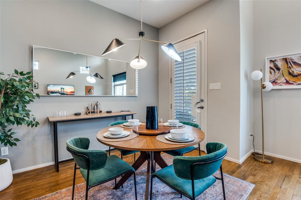 2012 Matilda Street Dallas, TX 75206 - Photo 11 of 24 a kitchen with a table and chairs in it
