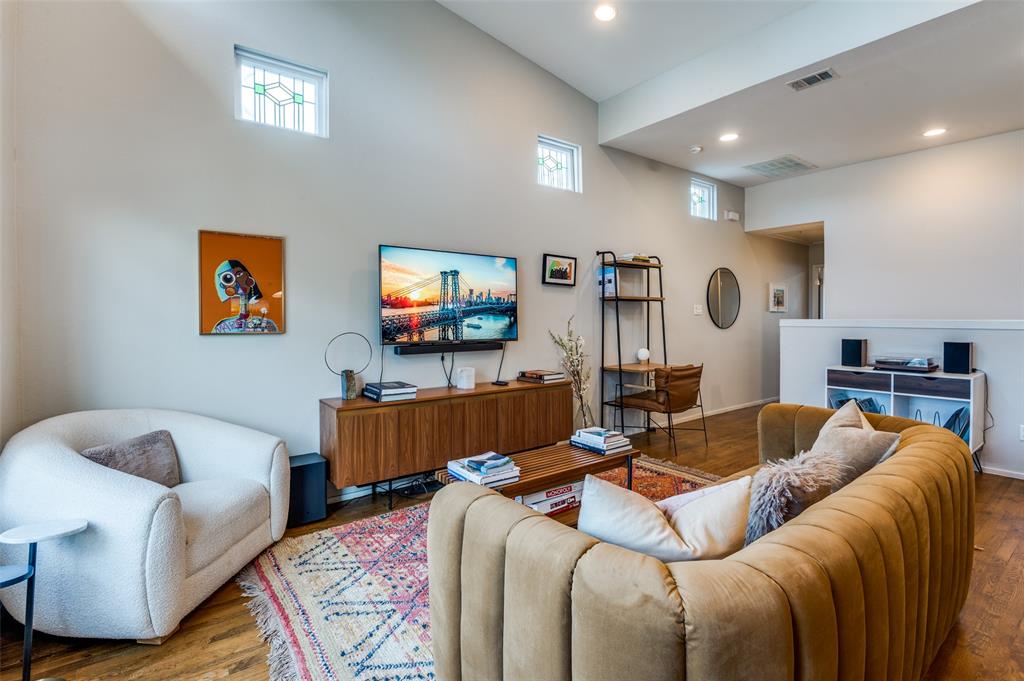2012 Matilda Street Dallas, TX 75206 - Photo 6 of 24 a living room with furniture and a flat screen tv