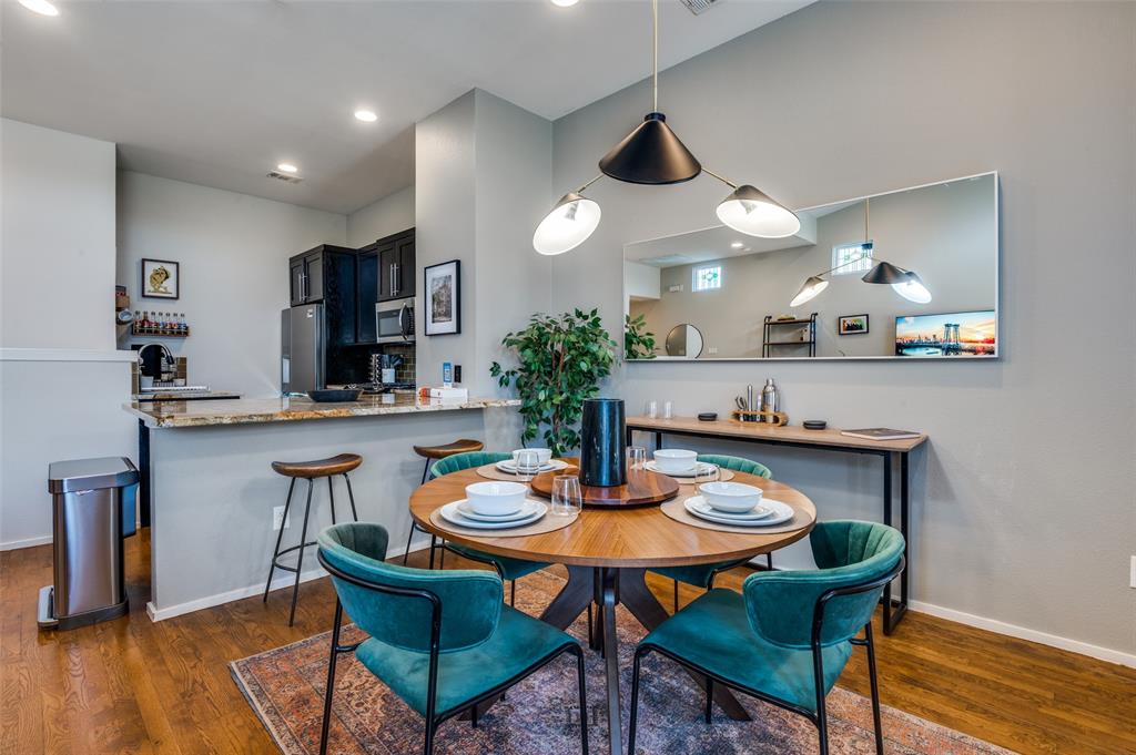 2012 Matilda Street Dallas, TX 75206 - Photo 10 of 24 a kitchen with a table chairs stove and cabinets