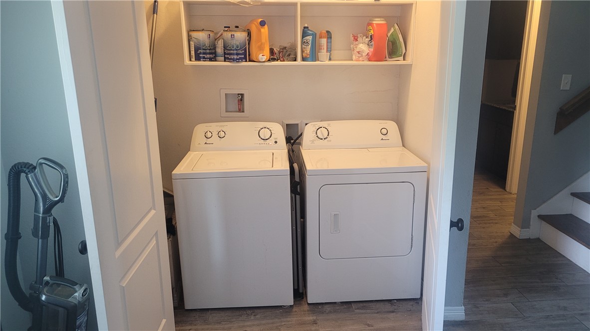 301 Southwest Parkway, Unit 304 College Station, TX 77840 - Photo 9 of 12 a utility room with dryer and washer