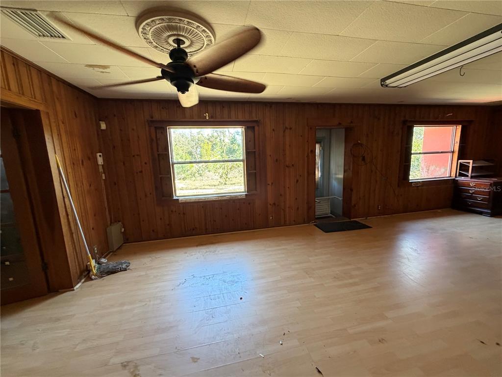 9602 North Taylor Road Seffner, FL 33584 - Photo 17 of 24 a view of an empty room with a window