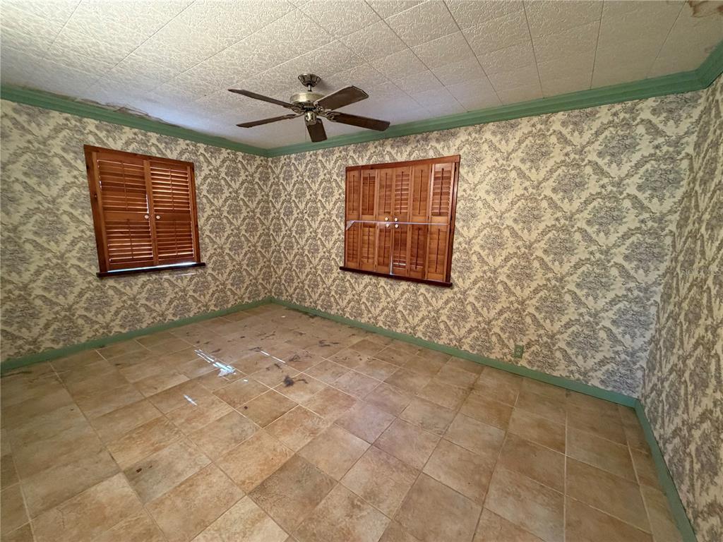 9602 North Taylor Road Seffner, FL 33584 - Photo 23 of 24 a view of an empty room with a window