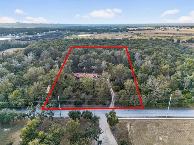 a front view of a house with yard