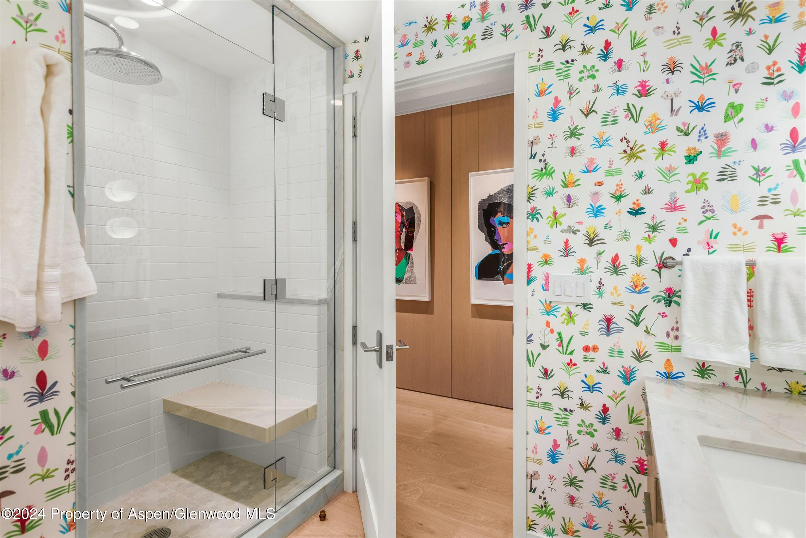 233 East Cooper Avenue, Unit 207 Aspen, CO 81611 - Photo 30 of 45 a bathroom with a shower curtain
