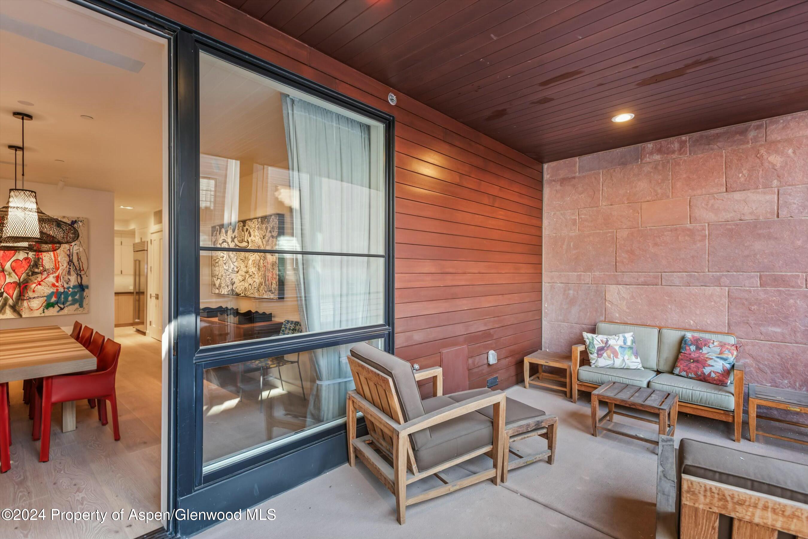 233 East Cooper Avenue, Unit 207 Aspen, CO 81611 - Photo 39 of 45 a outdoor living space with furniture