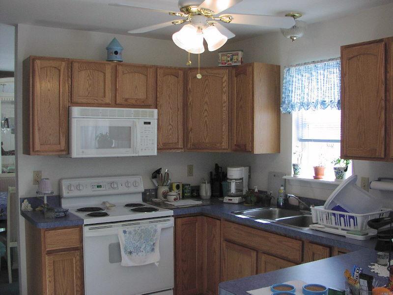 Lot 36 Haney Road Kunkletown, PA 18058 - Photo 4 of 7 a kitchen with stainless steel appliances granite countertop a sink stove and cabinets