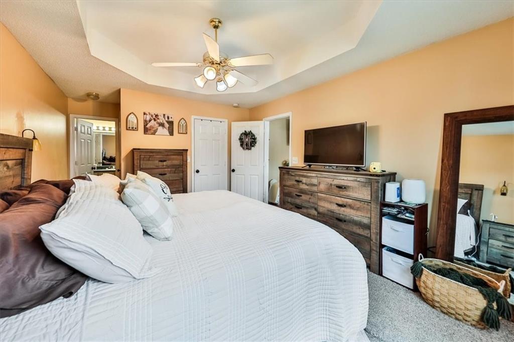 385 Prometheous Way Rockmart, GA 30153 - Photo 15 of 27 a bedroom with a bed and a flat screen tv