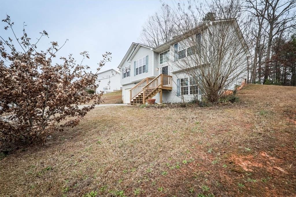 385 Prometheous Way Rockmart, GA 30153 - Photo 2 of 27 a view of a house with a yard