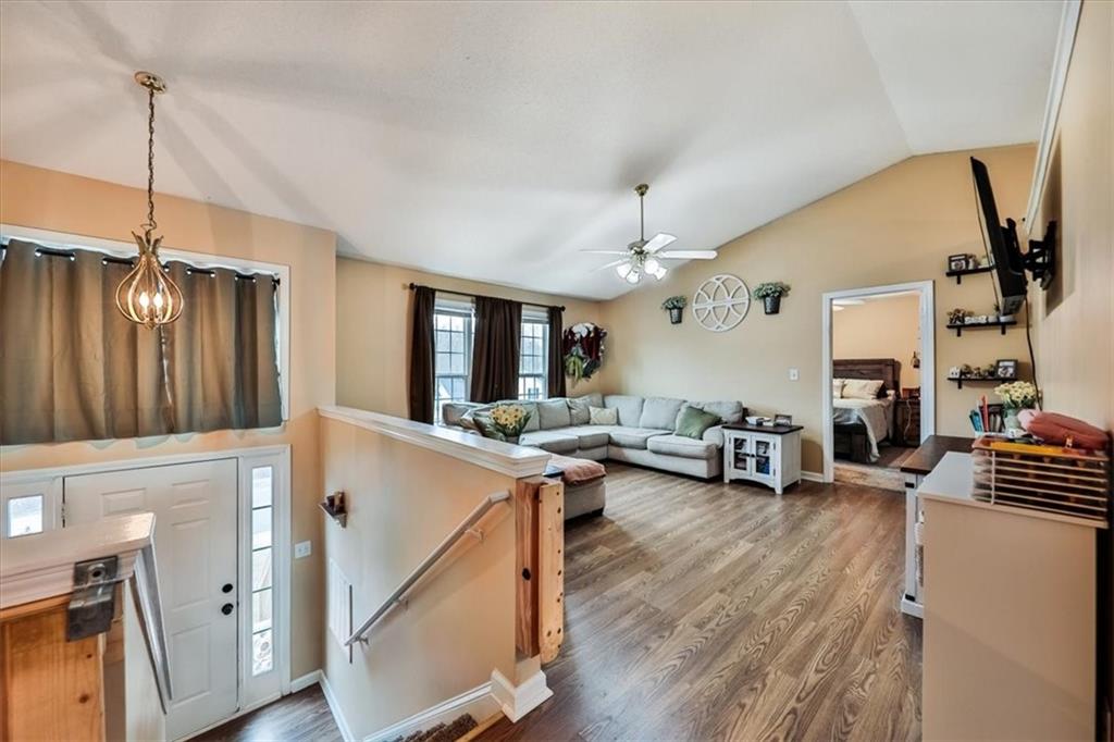 385 Prometheous Way Rockmart, GA 30153 - Photo 6 of 27 a living room with furniture and a wooden floor