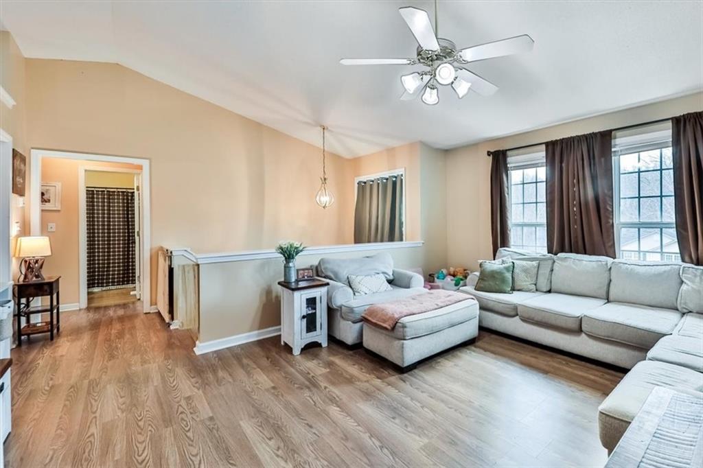 385 Prometheous Way Rockmart, GA 30153 - Photo 7 of 27 a living room with furniture and a large window