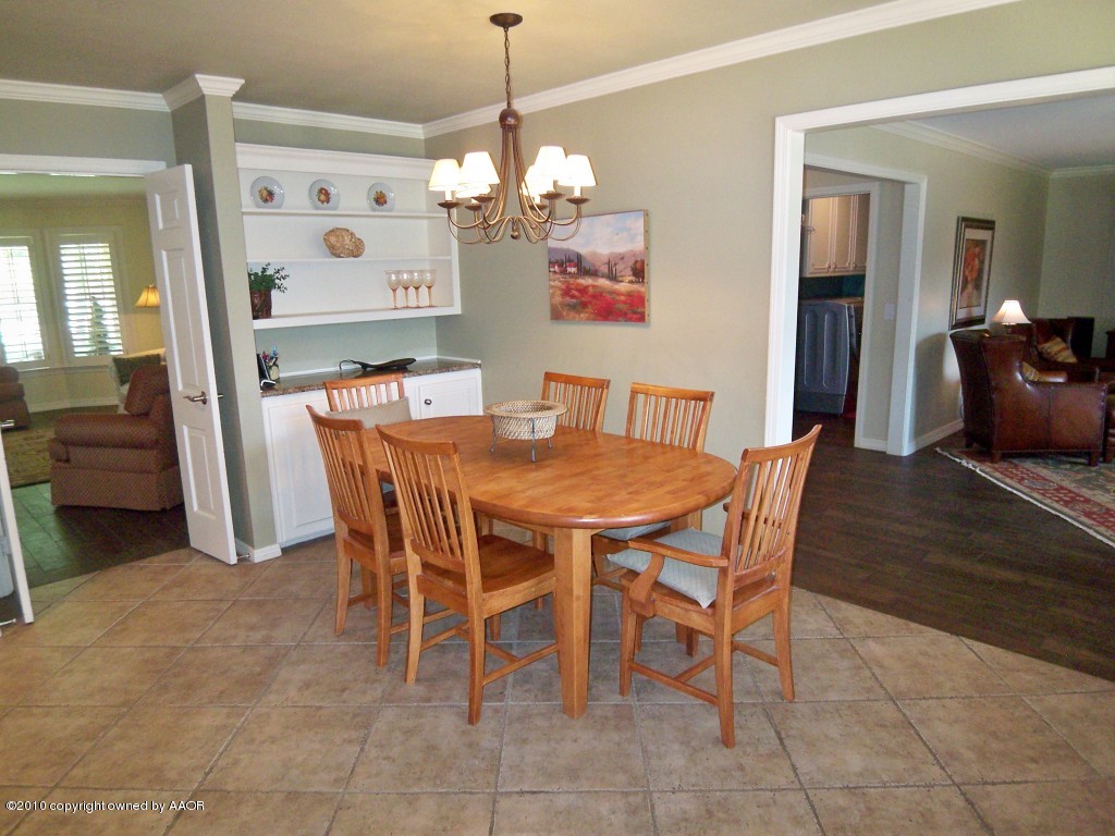 6301 Elmhurst Road Amarillo, TX 79106 - Photo 7 of 20 a dining room with furniture and window