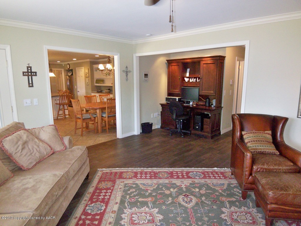 6301 Elmhurst Road Amarillo, TX 79106 - Photo 9 of 20 a living room with furniture rug and window