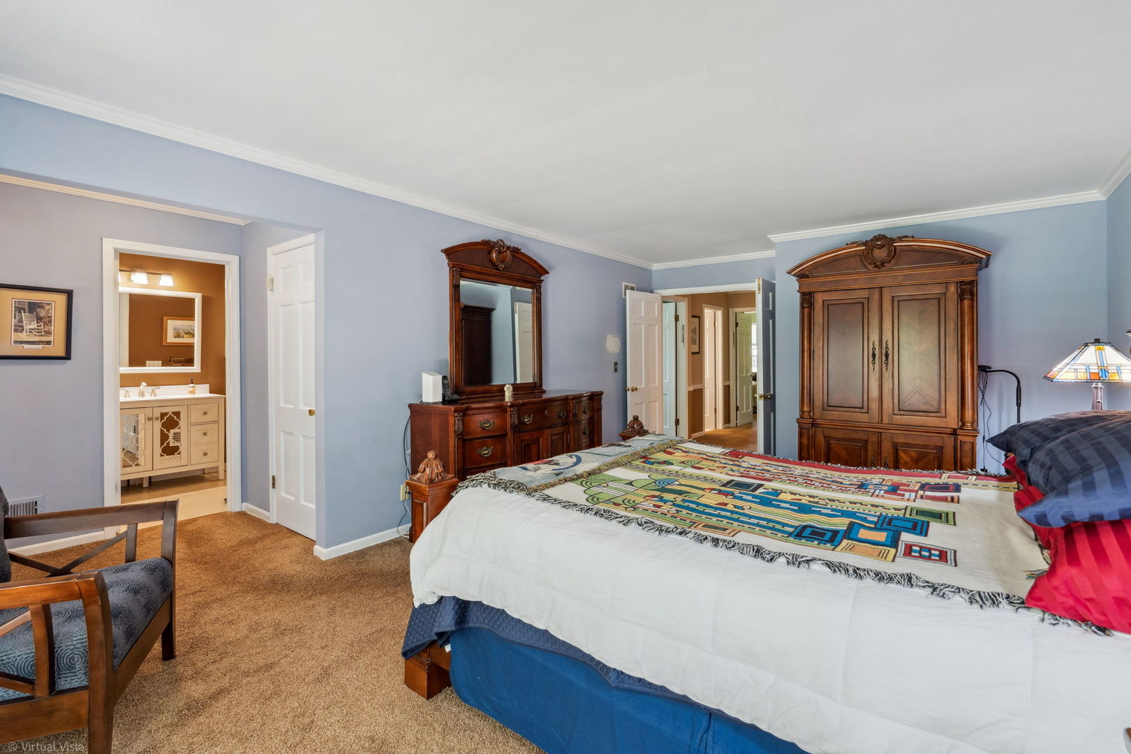 396 Jervey Lane Bartlett, IL 60103 - Photo 28 of 39 a bedroom with a bed and a potted plant on dresser