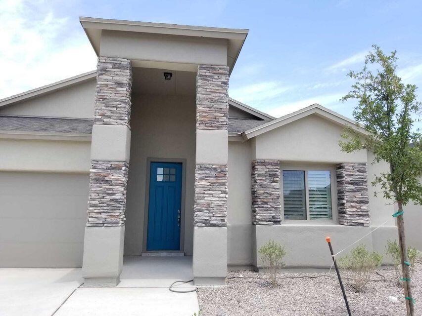 1088 Gallium Avenue Anthony, NM 88021 - Photo 1 of 1 a front view of a house with a yard