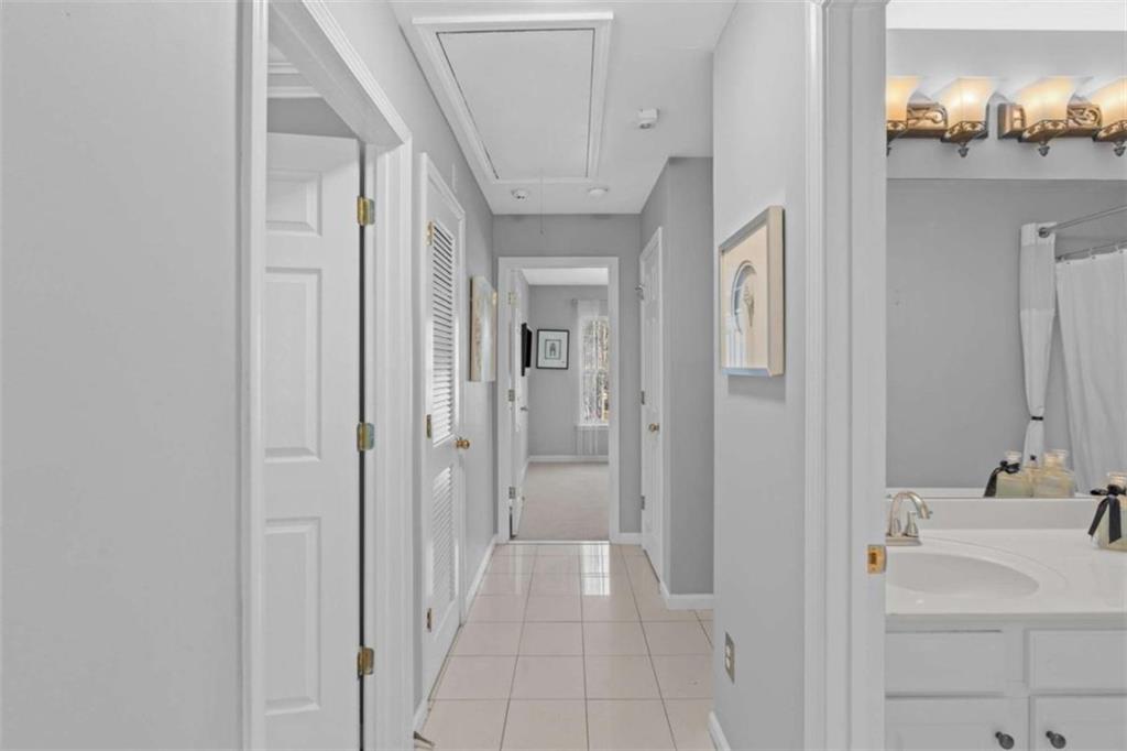 7200 Suttles Drive Southwest South Fulton, GA 30331 - Photo 22 of 44 a bathroom with a sink and a mirror