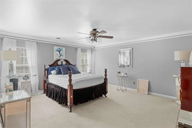 a bed room with bed and window