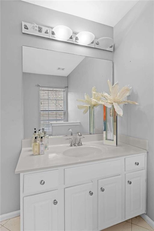 7200 Suttles Drive Southwest South Fulton, GA 30331 - Photo 29 of 44 a bathroom with a sink and a mirror
