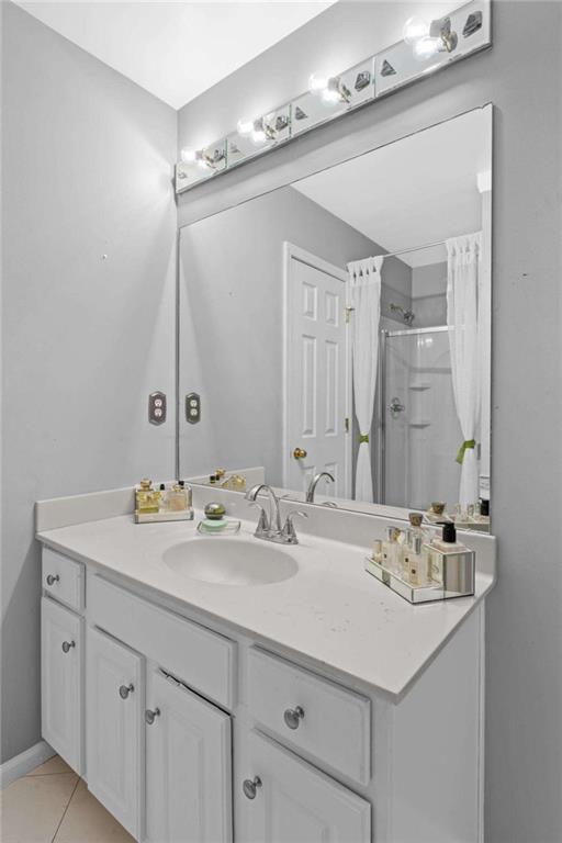 7200 Suttles Drive Southwest South Fulton, GA 30331 - Photo 30 of 44 a bathroom with a sink double vanity and a mirror