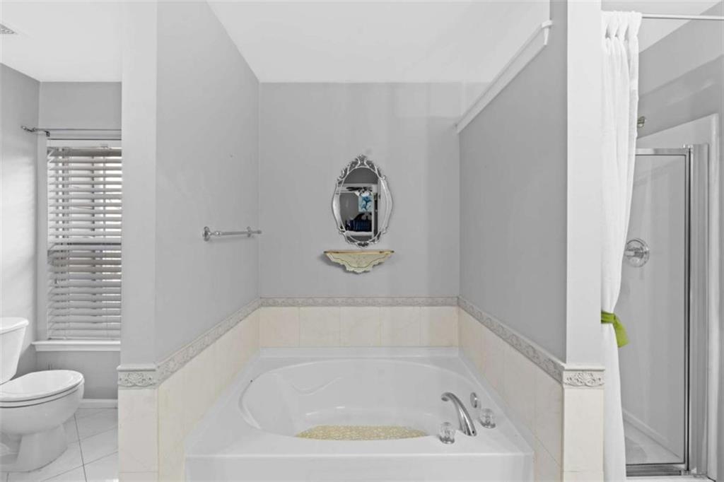 7200 Suttles Drive Southwest South Fulton, GA 30331 - Photo 34 of 44 a bathroom with a bathtub