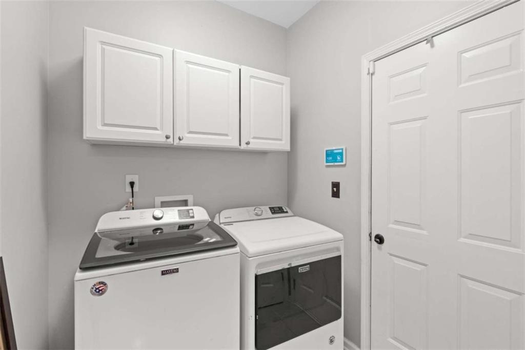 7200 Suttles Drive Southwest South Fulton, GA 30331 - Photo 35 of 44 a utility room with dryer and washer