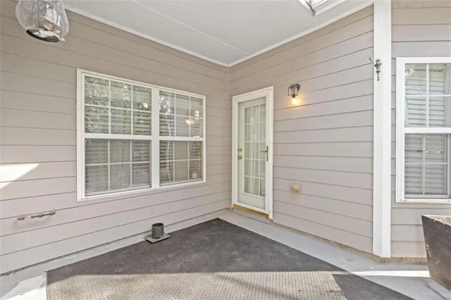a front view of a house with a porch