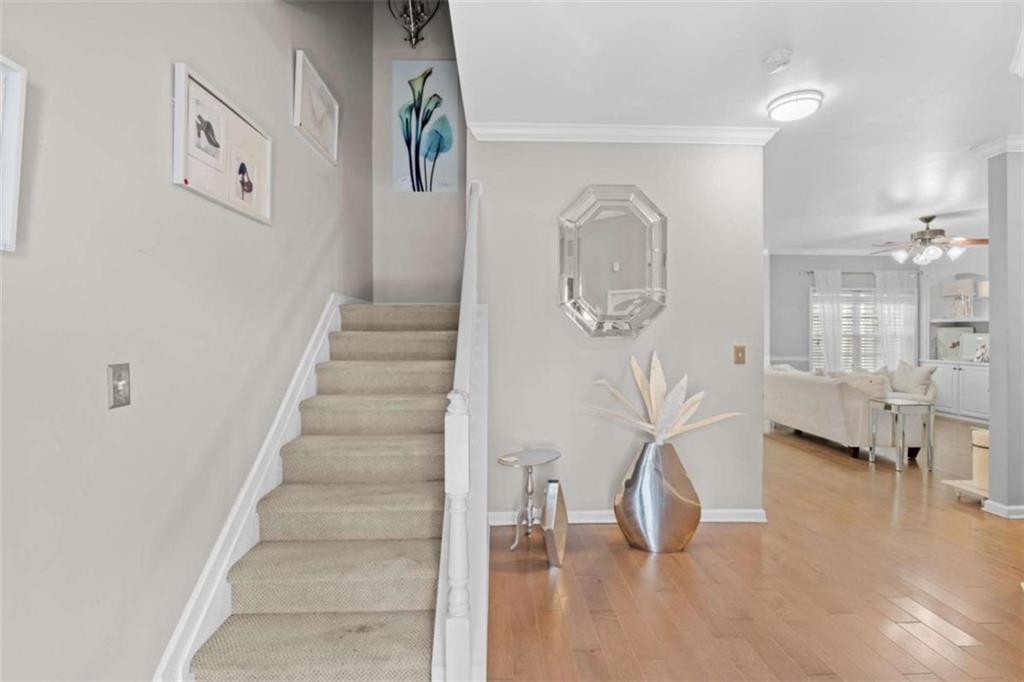 7200 Suttles Drive Southwest South Fulton, GA 30331 - Photo 8 of 44 a view of entryway and hall with wooden floor