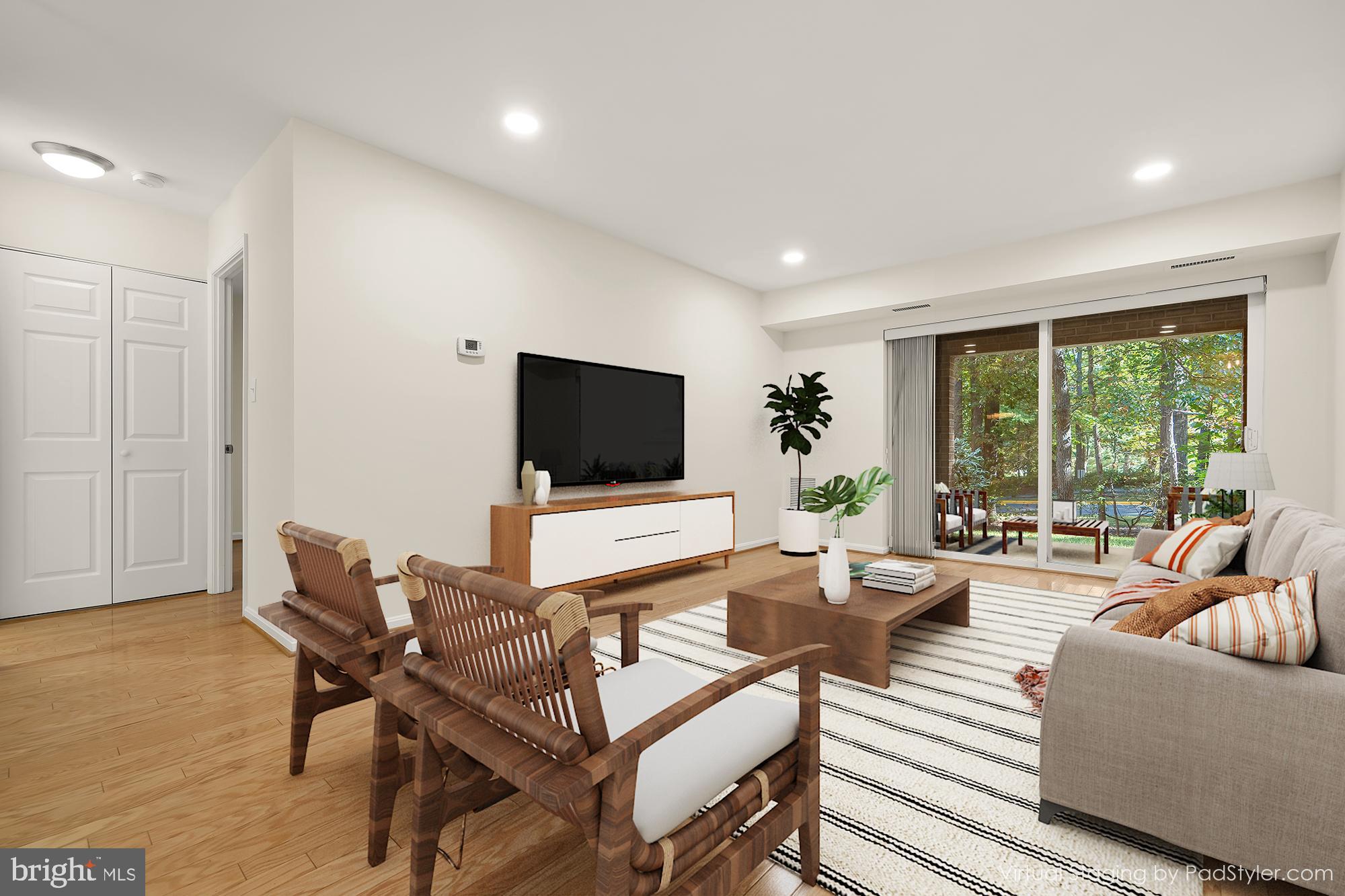 5932 Cove Landing Road, Unit 101 Burke, VA 22015 - Photo 2 of 45 living room - virtually staged