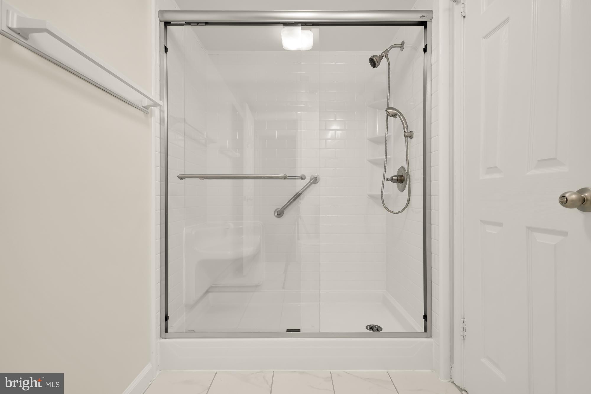 5932 Cove Landing Road, Unit 101 Burke, VA 22015 - Photo 28 of 45 updated walk in shower