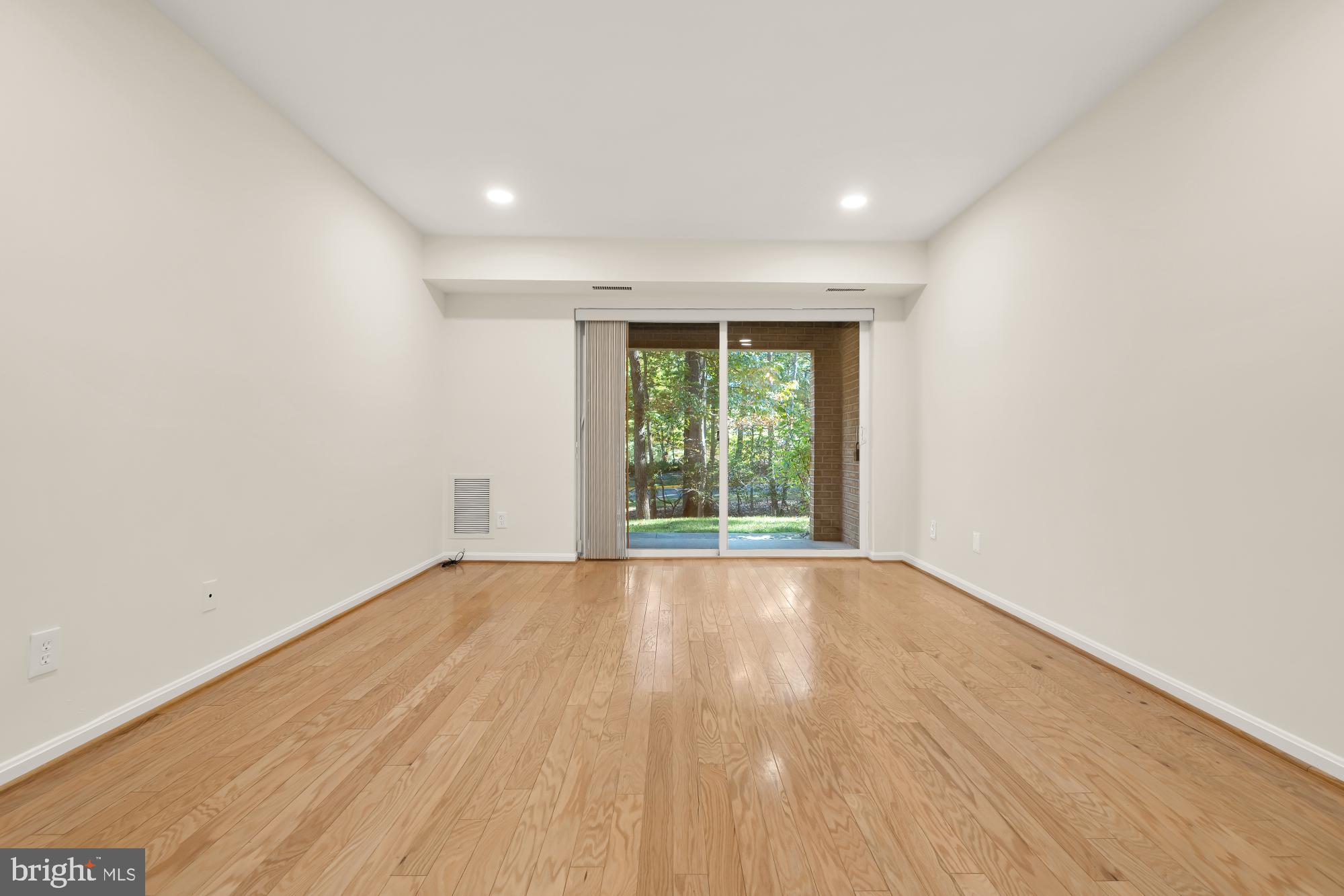 5932 Cove Landing Road, Unit 101 Burke, VA 22015 - Photo 4 of 45 living room with hardwood floors