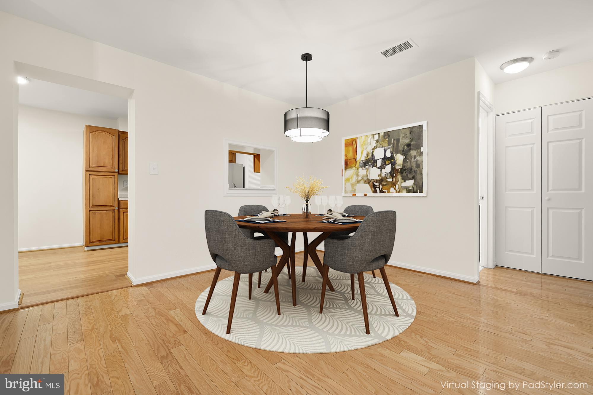 5932 Cove Landing Road, Unit 101 Burke, VA 22015 - Photo 9 of 45 dining room - virtually staged