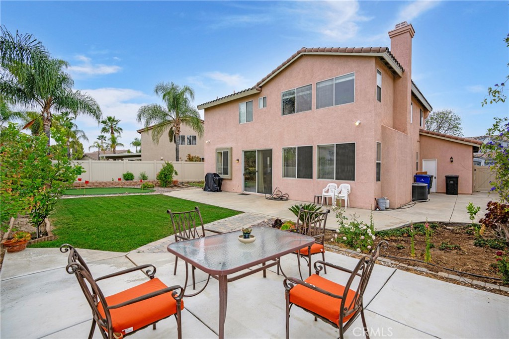 8946 Burlington Circle Riverside, CA 92508 - Photo 1 of 26 a view of a yard with furniture