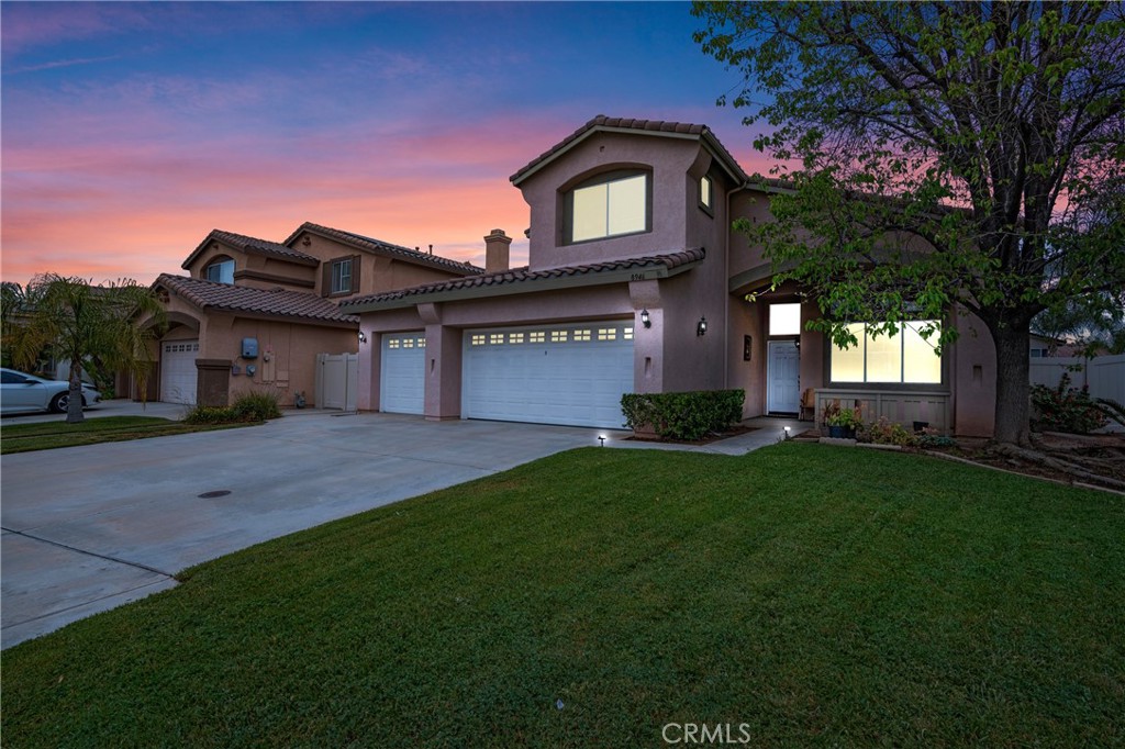 8946 Burlington Circle Riverside, CA 92508 - Photo 26 of 26 a front view of a house with a garden and yard