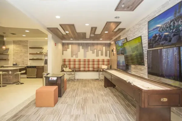 a large living room with a large window