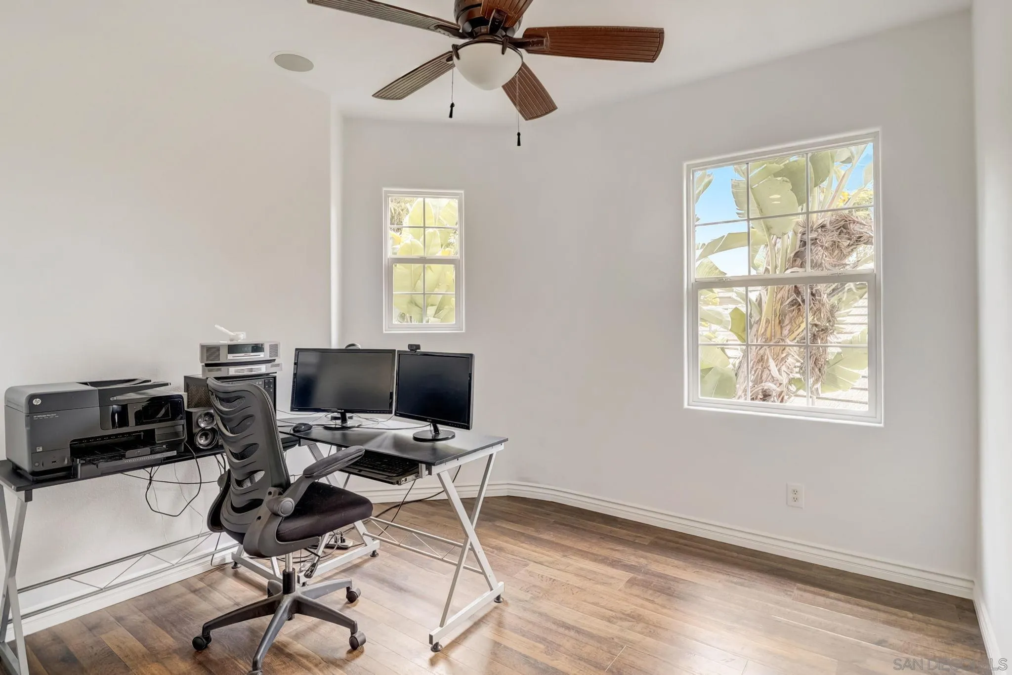 648 Beach Street Encinitas, CA 92024 - Photo 14 of 31 a view of a workspace with furniture and a window
