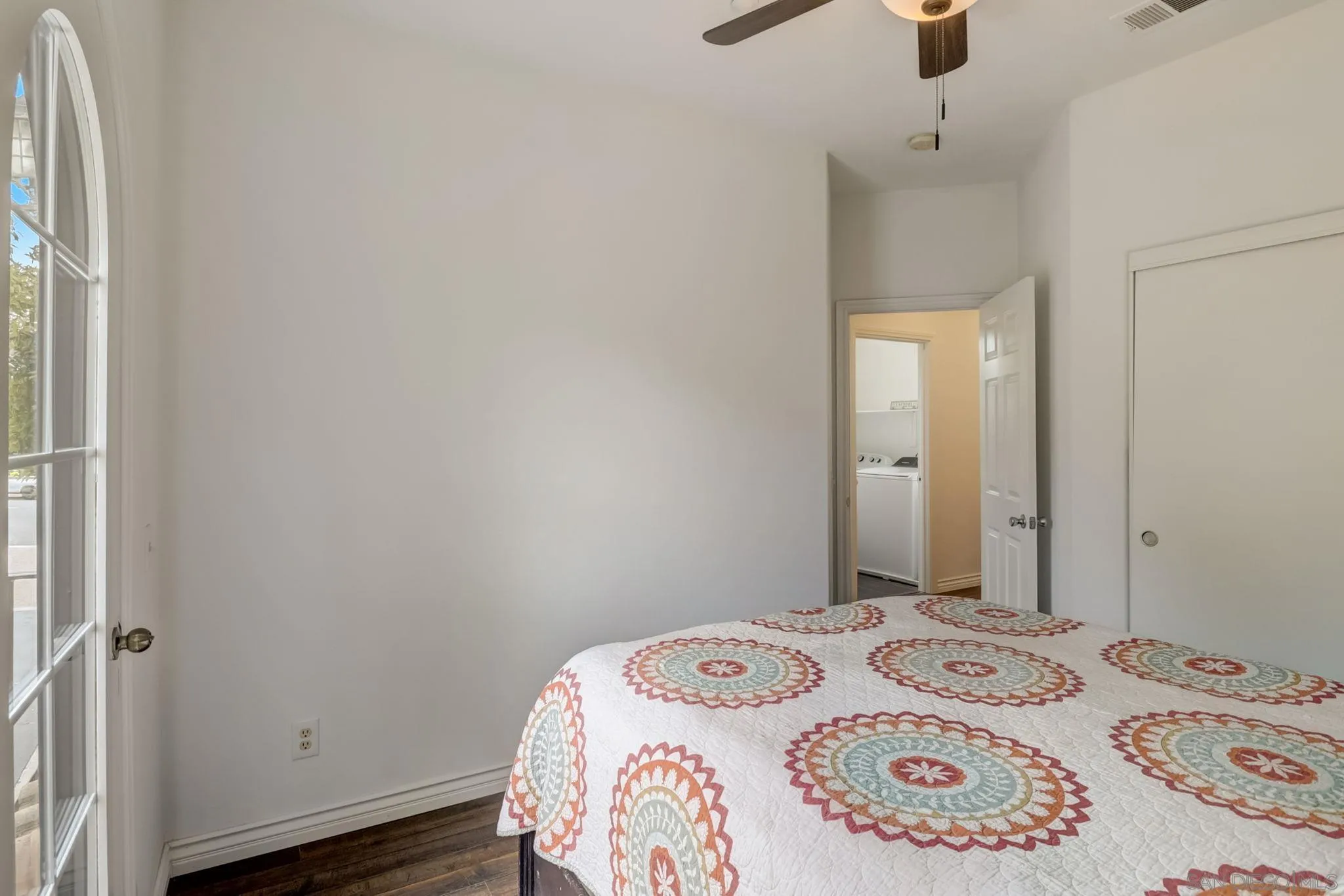 648 Beach Street Encinitas, CA 92024 - Photo 17 of 31 a bedroom with a bed and a window