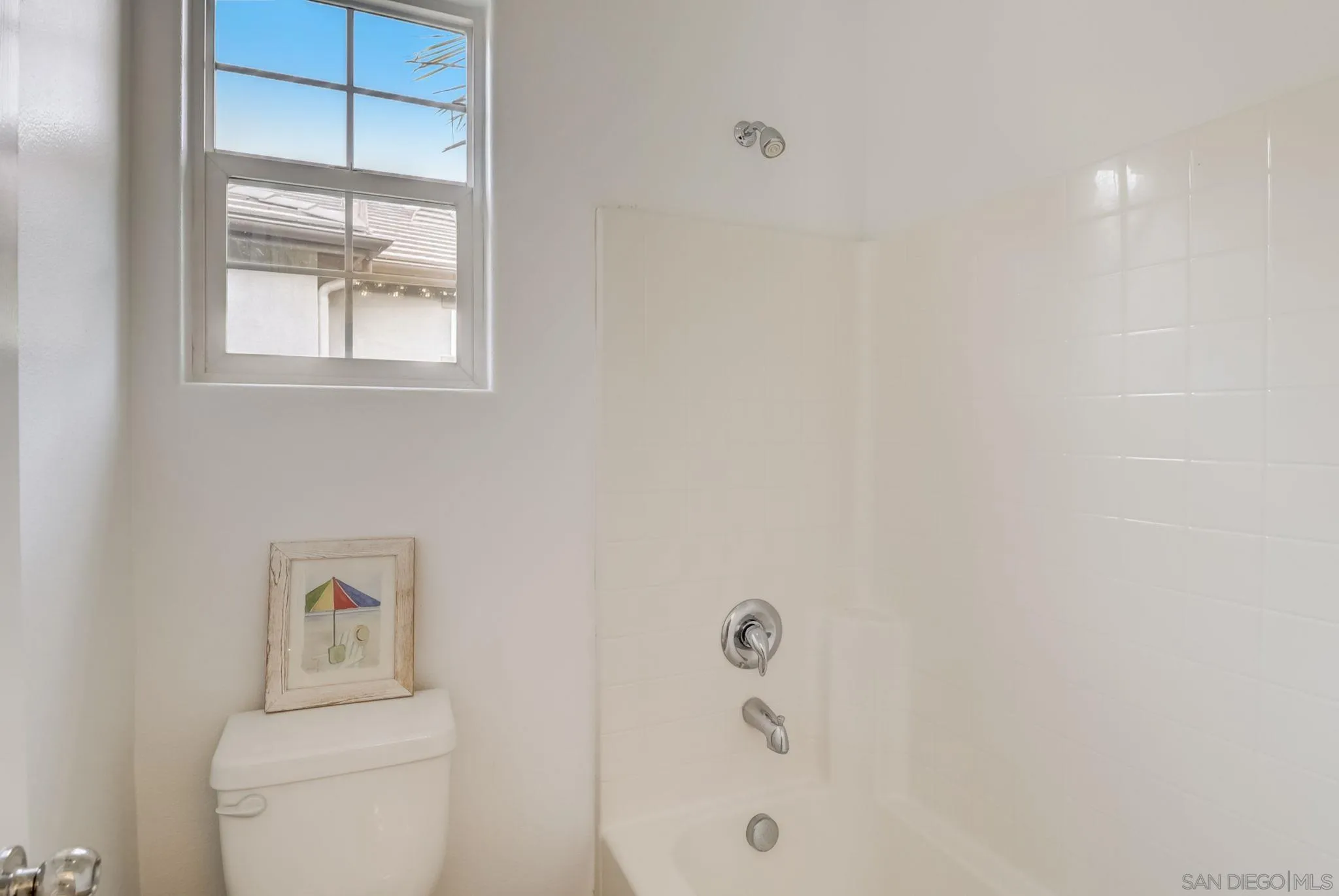 648 Beach Street Encinitas, CA 92024 - Photo 19 of 31 a bathroom with a toilet and a shower