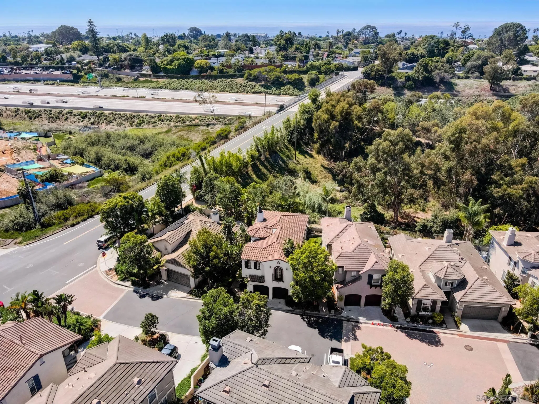 648 Beach Street Encinitas, CA 92024 - Photo 29 of 31 an aerial view of residential houses with outdoor space and parking
