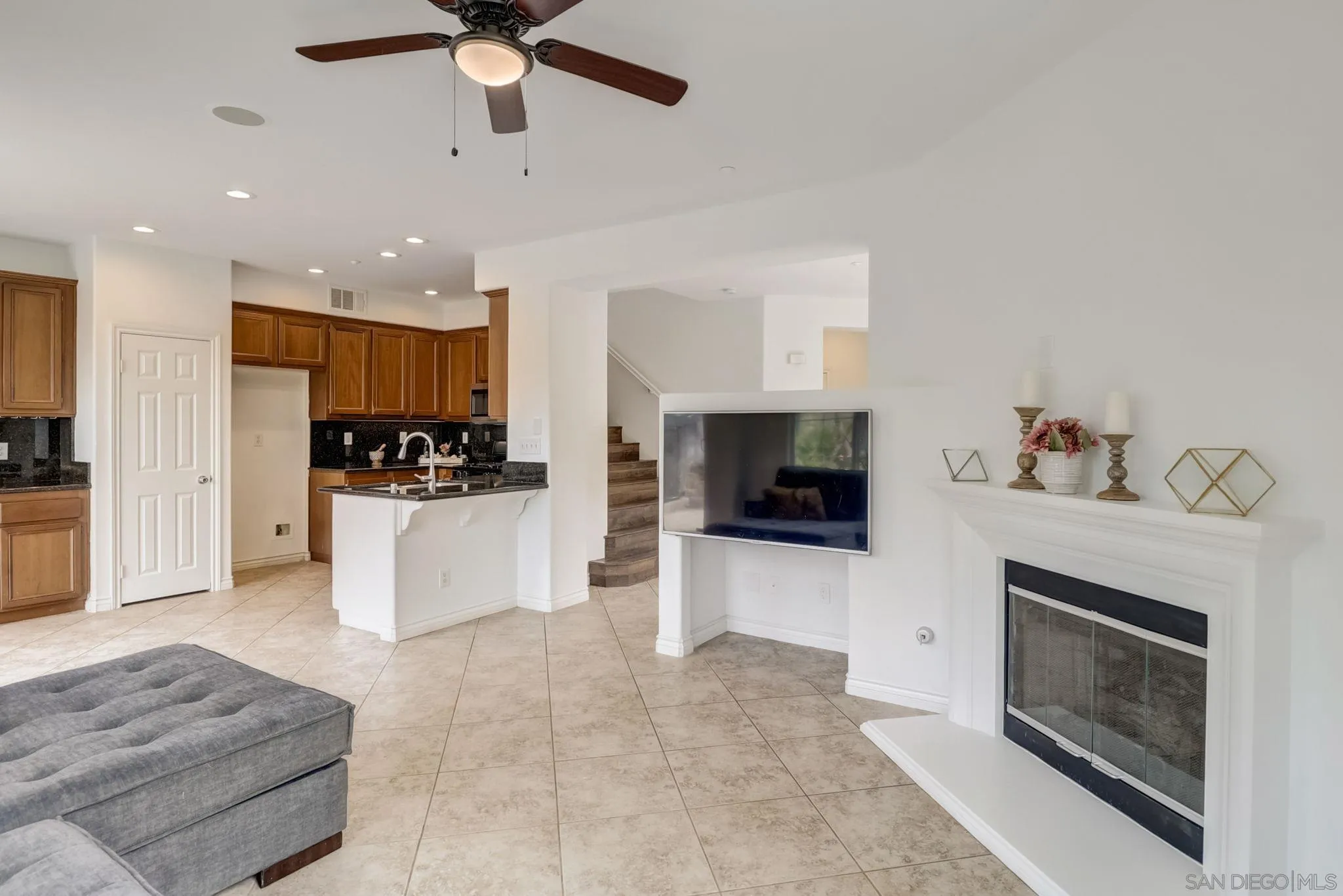 648 Beach Street Encinitas, CA 92024 - Photo 9 of 31 a living room with furniture and a fireplace