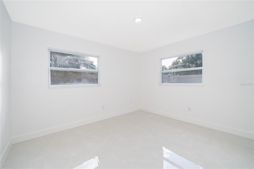 146 Exeter Avenue Longwood, FL 32750 - Photo 16 of 25 an empty room with a window