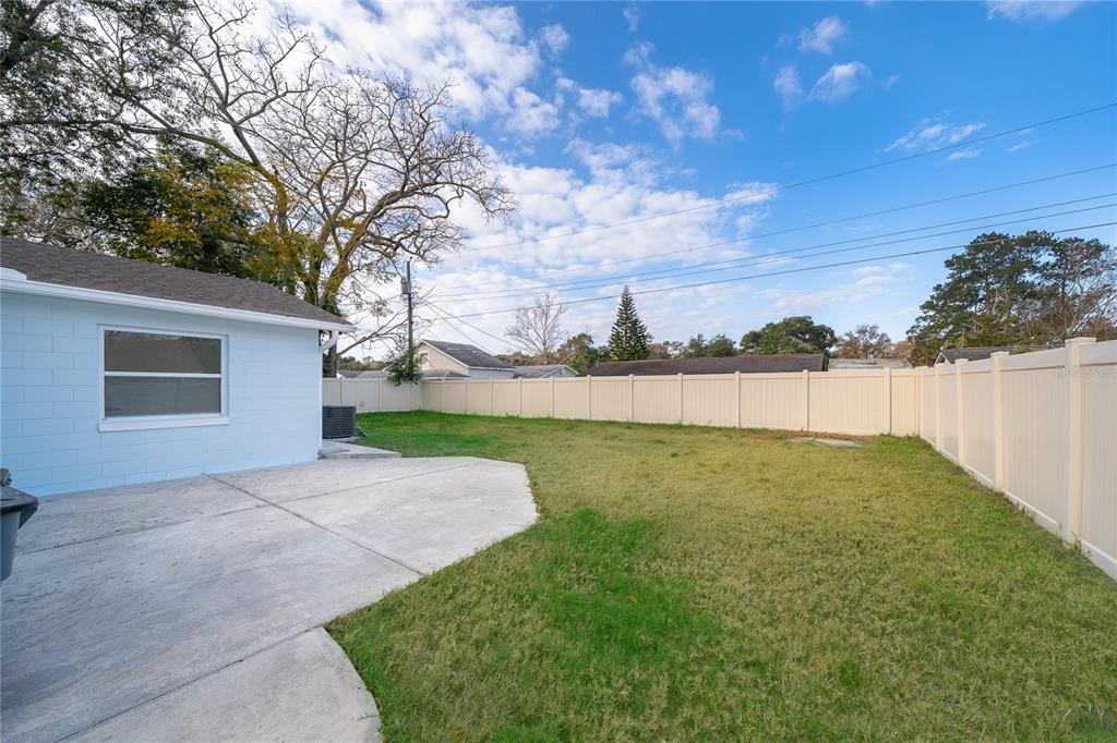 146 Exeter Avenue Longwood, FL 32750 - Photo 24 of 25 a view of yard with swimming pool and green space