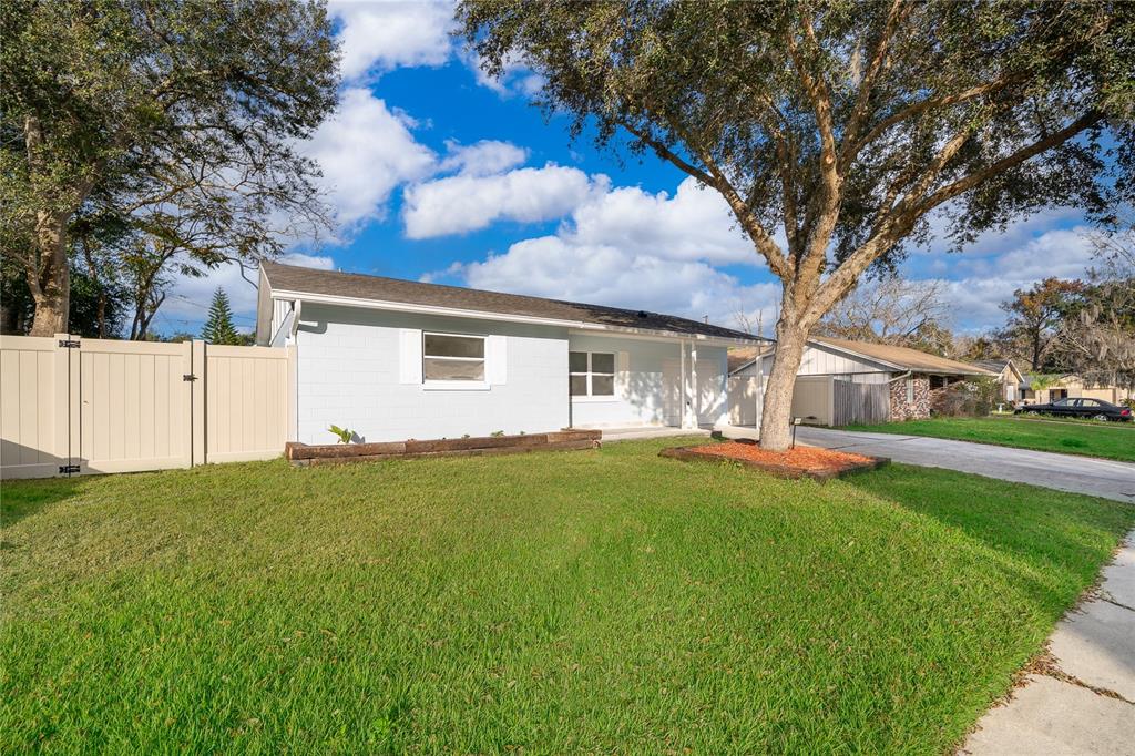 146 Exeter Avenue Longwood, FL 32750 - Photo 3 of 25 a backyard of a house with table and chairs