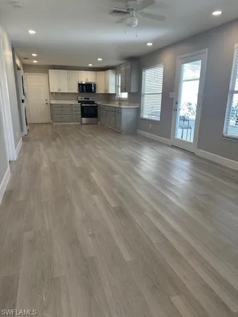 a view of a kitchen with a sink