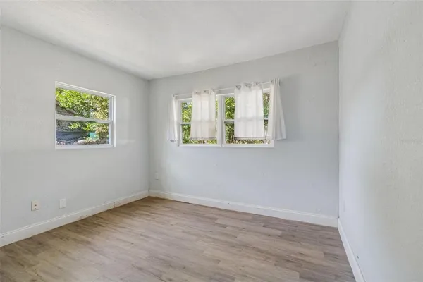 an empty room with windows