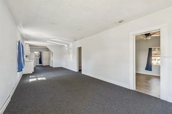 a view of a big room with closet and cabinet