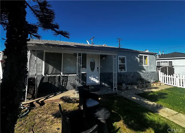 front view of a house with a patio