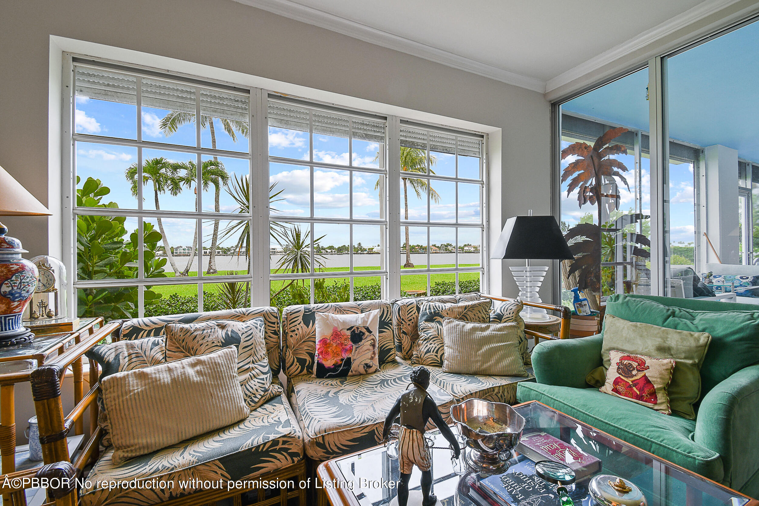 2170 Ibis Isle Road, Unit 2 Palm Beach, FL 33480 - Photo 11 of 38 a living room with furniture and a large window
