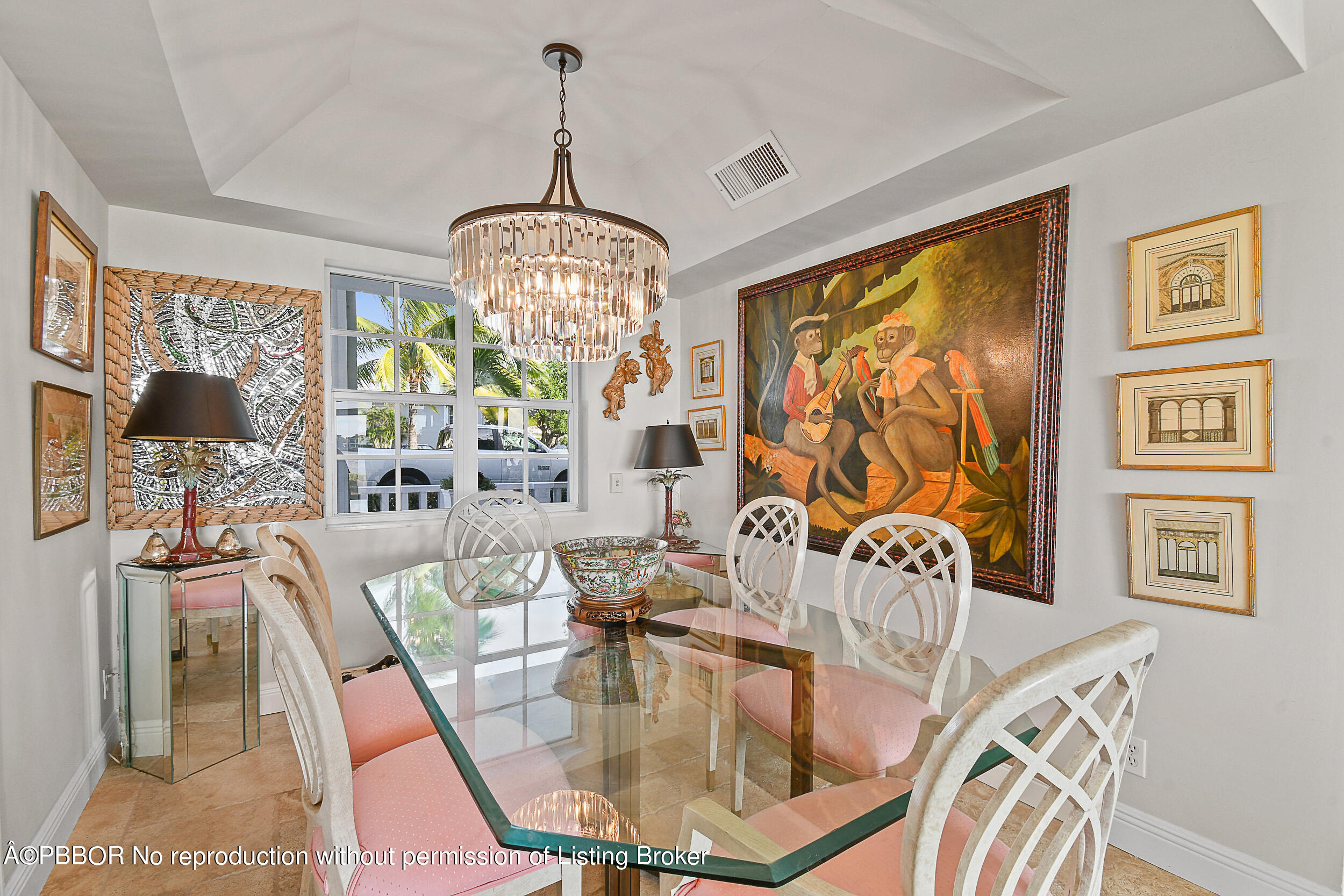 2170 Ibis Isle Road, Unit 2 Palm Beach, FL 33480 - Photo 16 of 38 a view of a dining room with furniture a chandelier and large windows